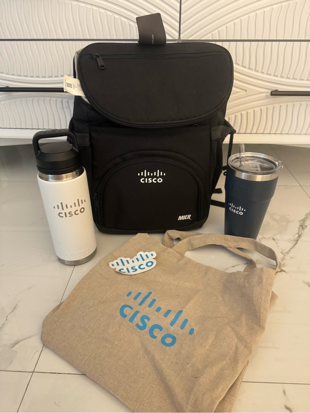 Cisco Black Cooler and Yeti Bottles